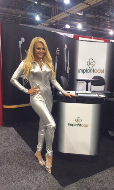 Blonde Event Booth Model in Silver Apparel